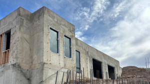 Exterior photo of unfinished custom home in Summit County, near Park City, Utah.