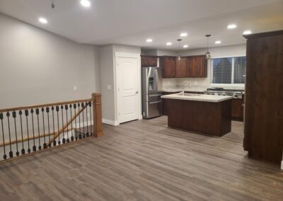 PleasantGrove_UtahCounty_CustomHome_LivingRoom_Kitchen_Stairs